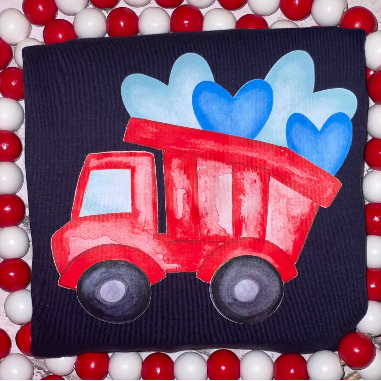 Valentines Day boys tee shirt with a red dumptruck hauling blue hearts 