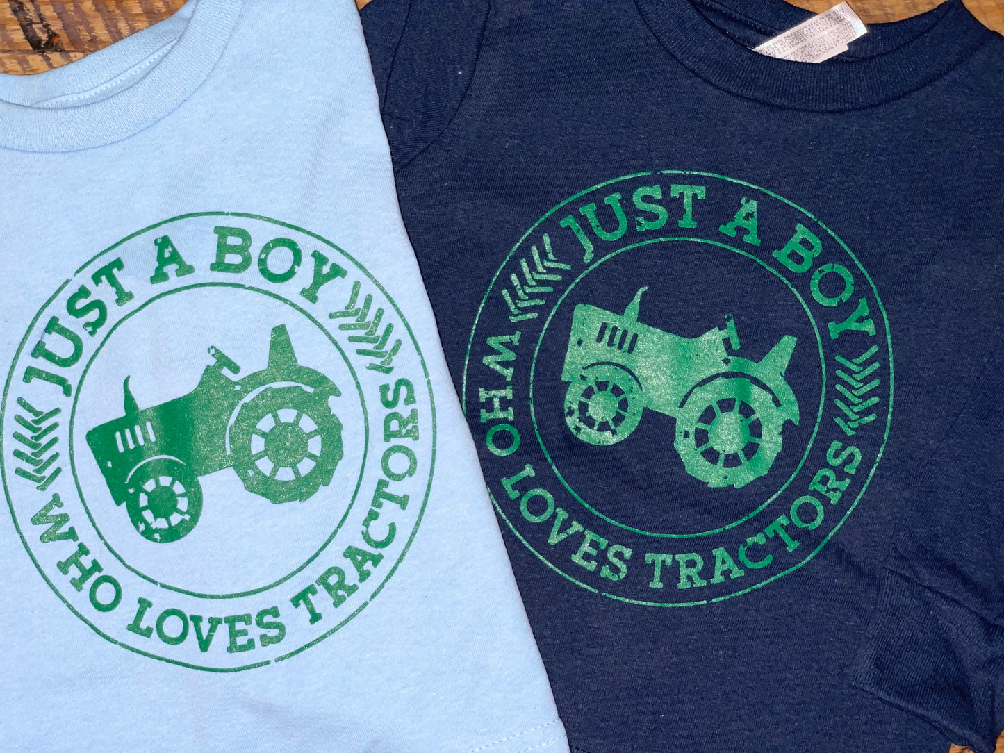Just a boy who loves tractors screen print tee shirt for baby boys, toddler boys, and big kids, light blue and navy with green 